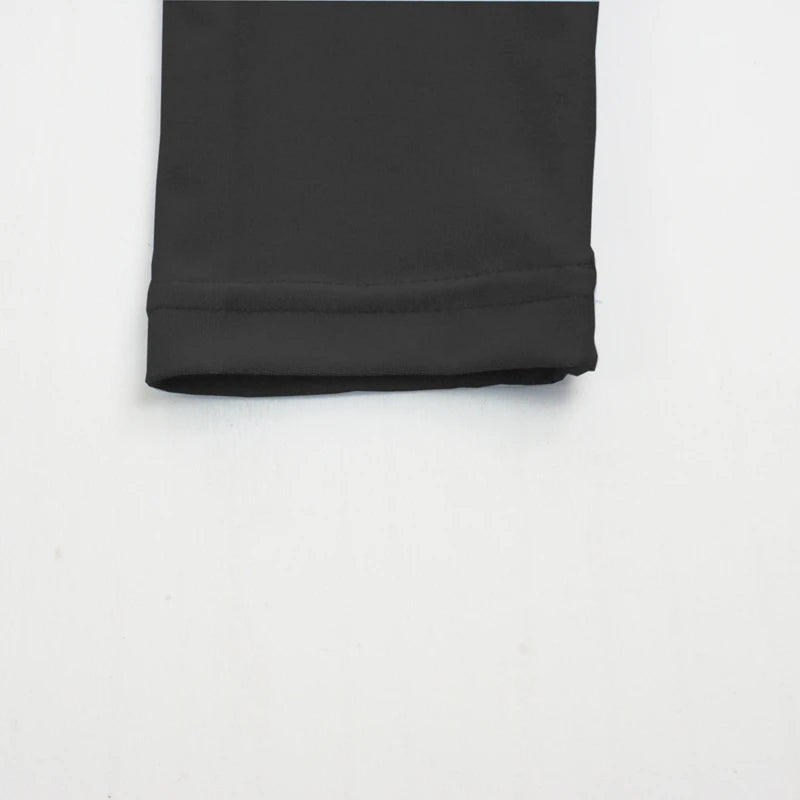 Conjunto Elegant Silhouette: Top Cropped de Manga Larga y Falda Midi Entallada