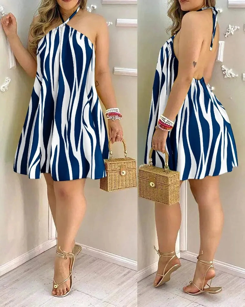 Vestido Tropical Breeze: Mini Vestido Halter con Estampado Tropical